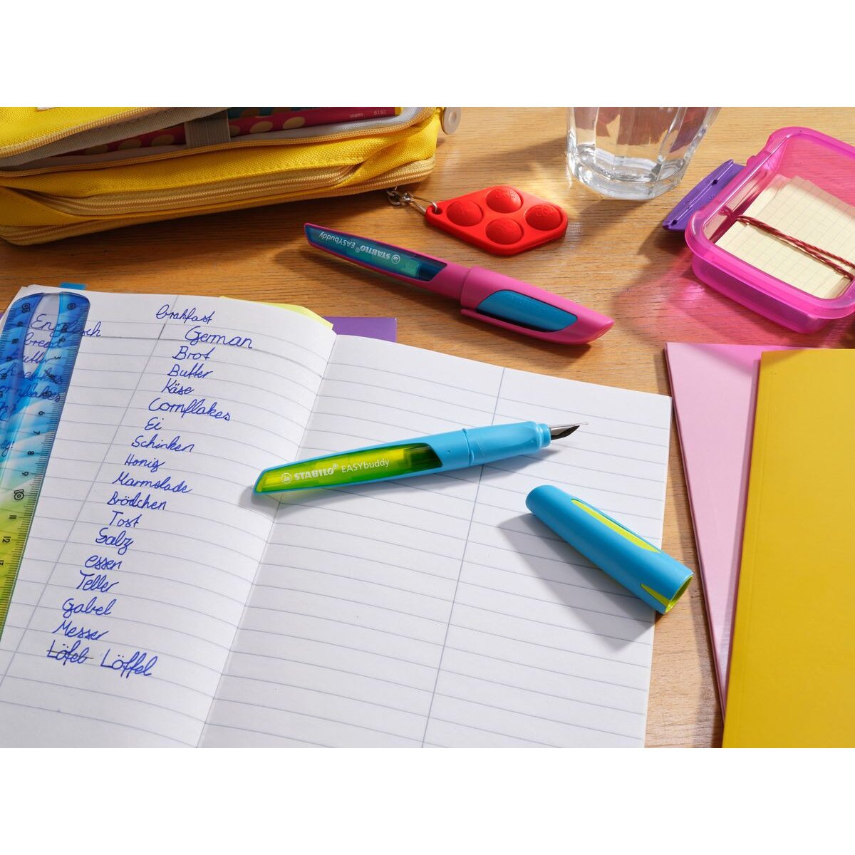 Schulfüller mit Linkshänder-Feder L - STABILO EASYbuddy FRESH in hellblau/limette - blau (löschbar) - inkl. Patrone